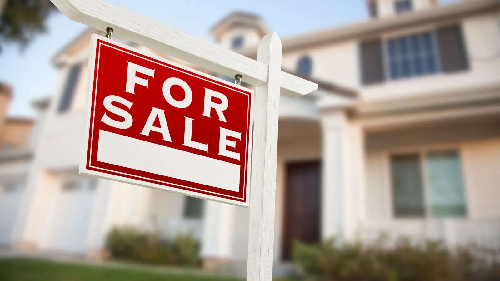 A for sale sign outside a High River home being marketed ahead of a foreclosure